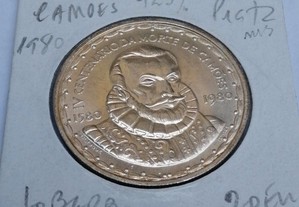 3 moedas de prata portuguesas e uma de níquel.