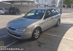 Mazda 323 1.3 - 99