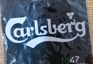 Base em borracha com a publicidade da cerveja Carlsberg em estado rigorosamente nova