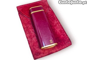 Cartier   Isqueiro  Les Must , oval, laca Bordeaux & dourado (Swiss Made)   com bolsa