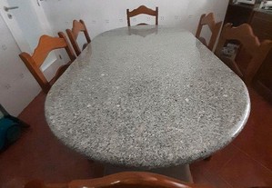 Mesa em pedra com 6 cadeiras