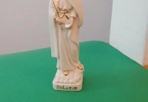 Escultura de Santa Luzia em porcelana