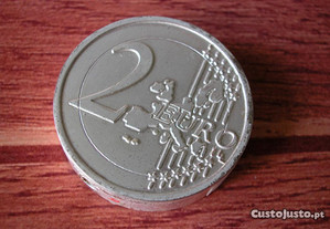 Isqueiro metálico em forma de moeda