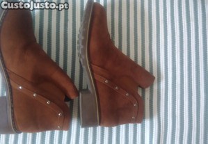 Botas fashion conforto e estilo