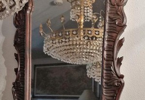 Espelho castanho maciço,ao estilo D.João V, talha vazada XIX