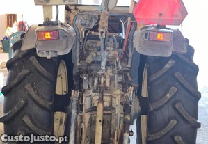 New Holland TN 65V + Adubadora