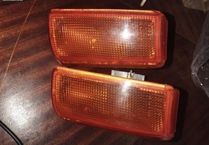2 farolins frente esq Opel Corsa A