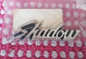 Emblema Shadow