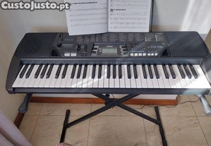 Teclado Casio CTK-700 com 100 ritmos, 100 sons e 100 musicas + suporte