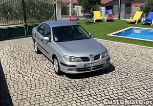 Nissan Almera N16 - 00