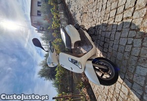 sym 125