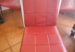 Cadeiras em nappa vermelha e pés chrome