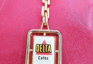 Porta chaves dos Cafés Delta, menção a Delta Oro
