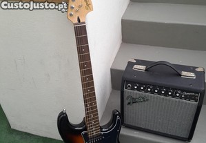 Guitarra elétrica e amplificador.