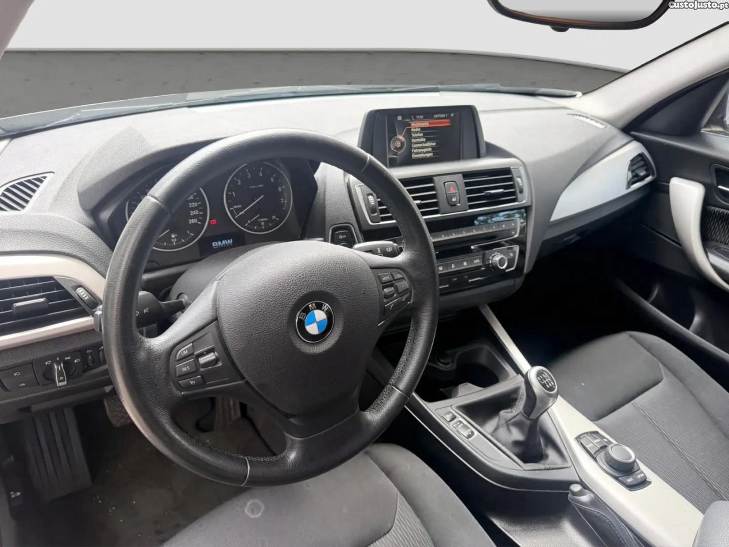 BMW 118 i Advantage — fotografia 12