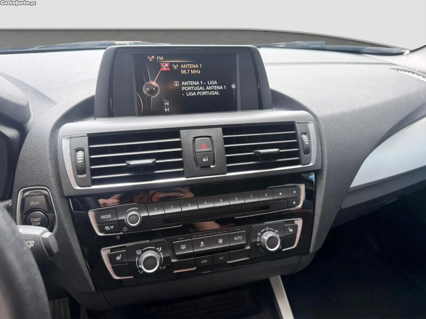 BMW 118 i Advantage — fotografia 10