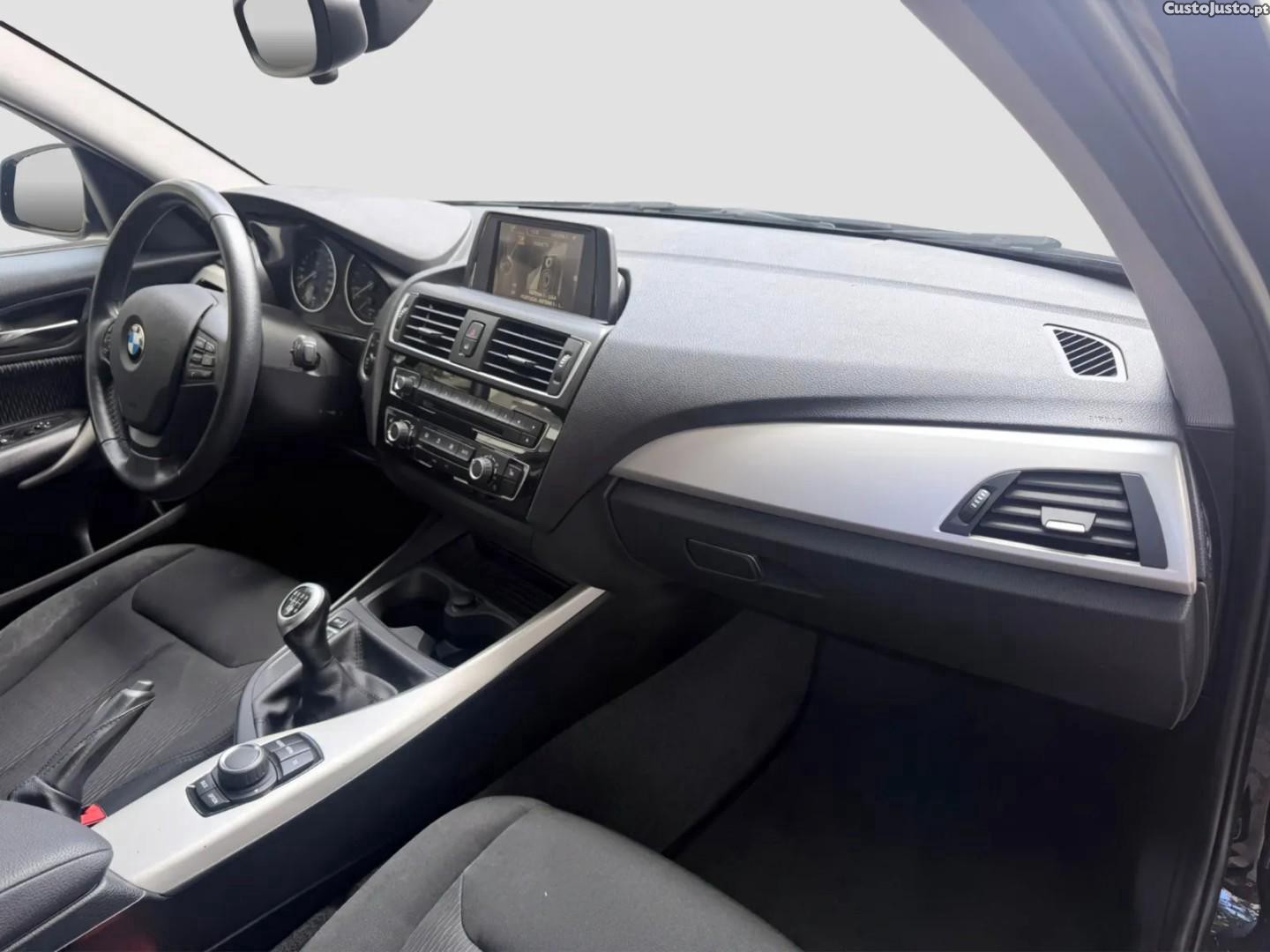 BMW 118 i Advantage — fotografia 11
