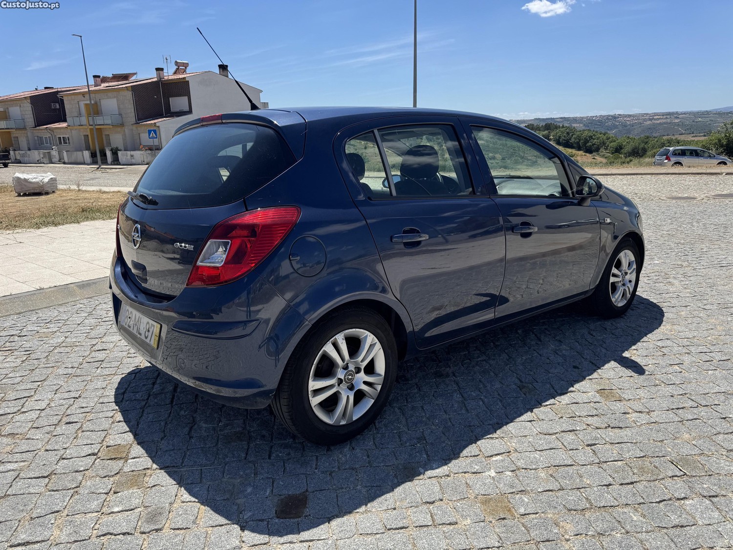 Opel Corsa 1.3cdti - 11 — photo 5