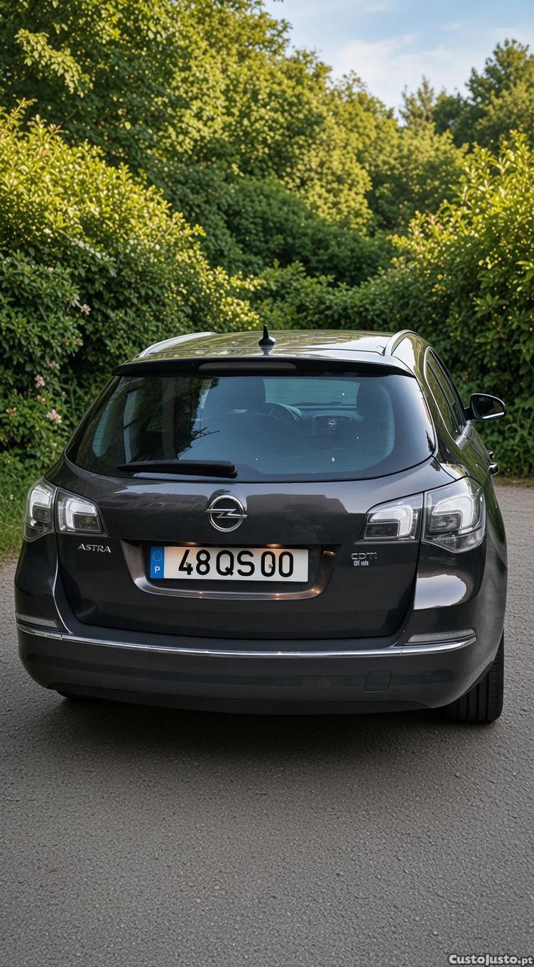 Opel Astra Sports Tourer - 15 — photo 3
