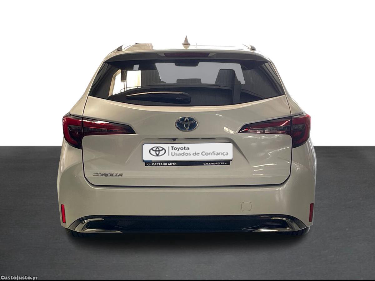 Toyota Corolla TS 1.8 Hybrid Comfort Plus — fotografia 12