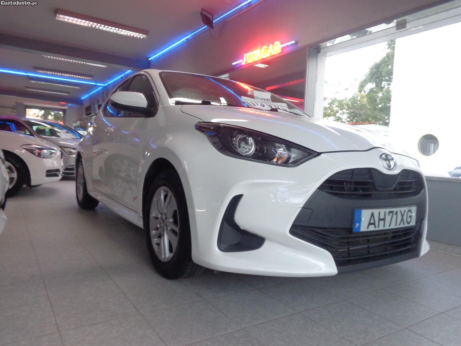 Toyota Yaris 1.0 VVT-I COMFORT PLUS 5 PORTAS - 21 — photo 2