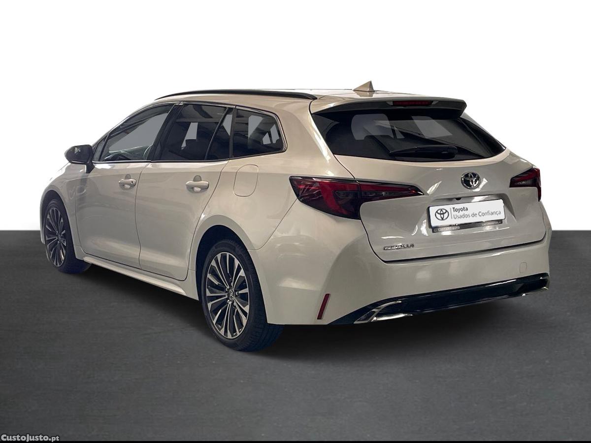 Toyota Corolla TS 1.8 Hybrid Comfort Plus — fotografia 14