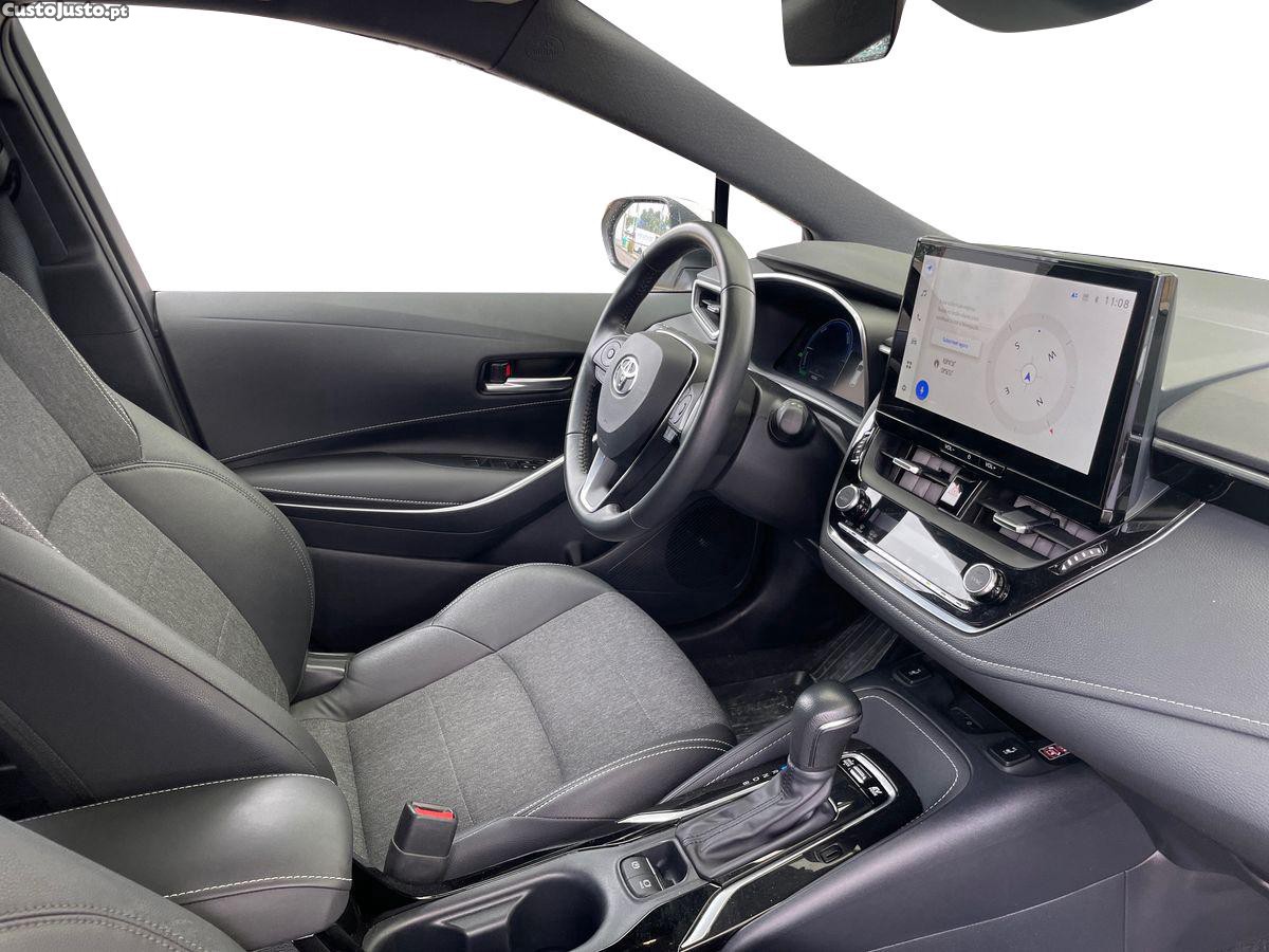 Toyota Corolla TS 1.8 Hybrid Comfort Plus — fotografia 11