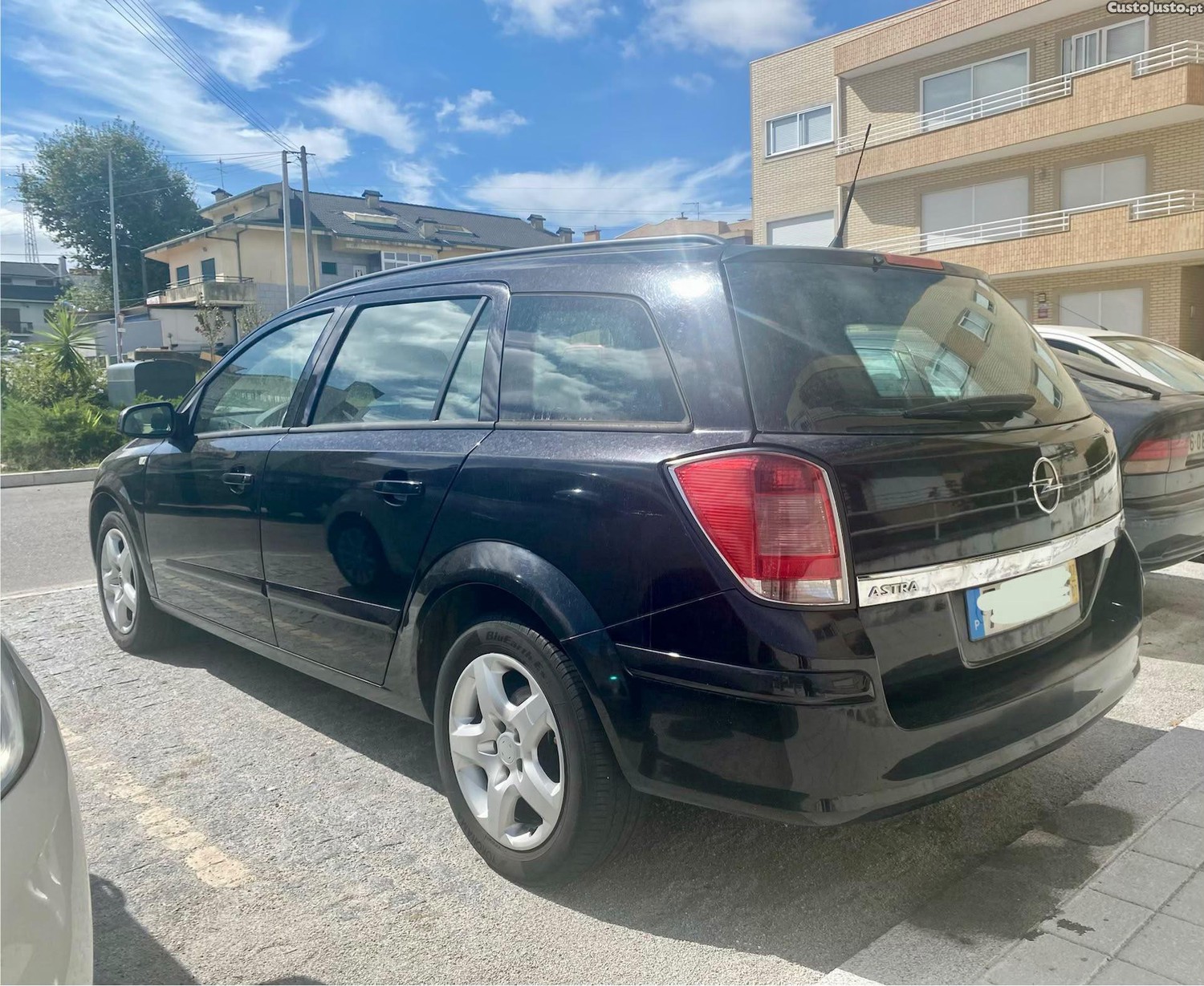 Opel Astra 1.3 cdti-90cv -AC — photo 2