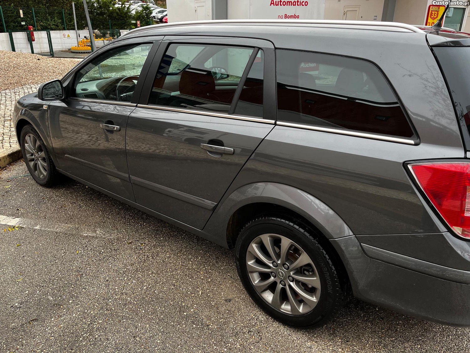 Opel Astra Caravan CosmoPlus ecoFLEX - 10 — photo 5