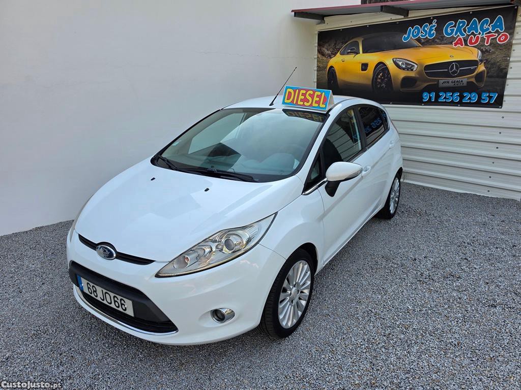 Ford Fiesta 1.4Tdci 70cv 07/2010 — fotografia 12