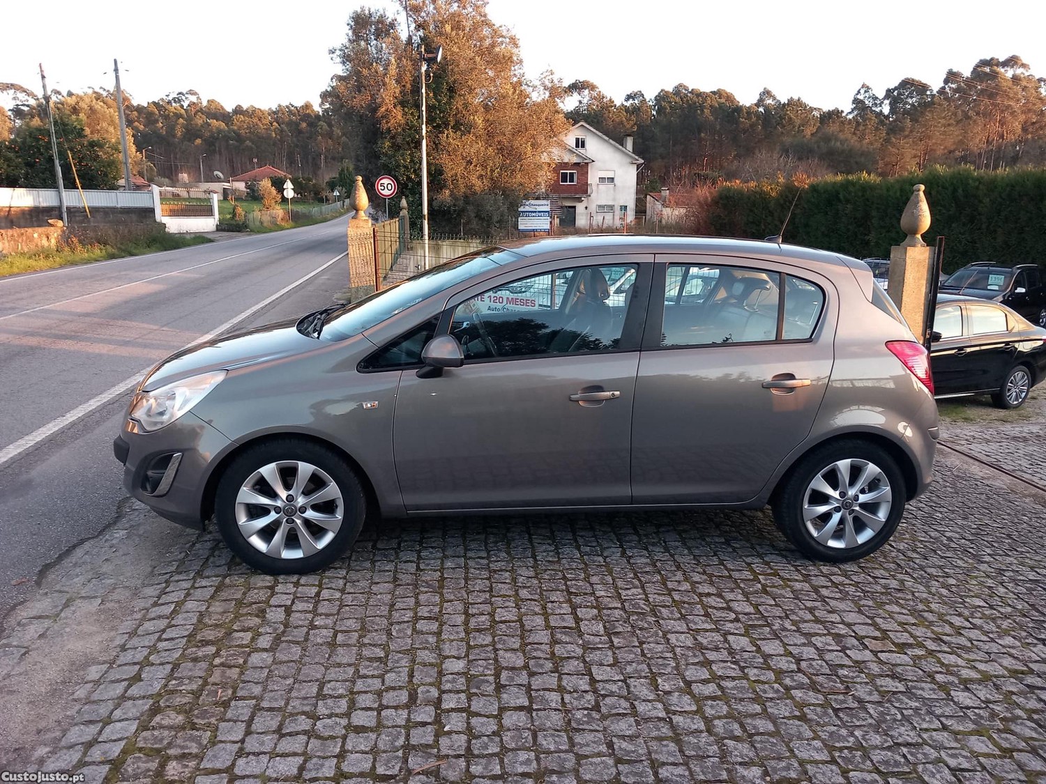 Opel Corsa D 1.2 Caixa Automática - 12 — photo 5