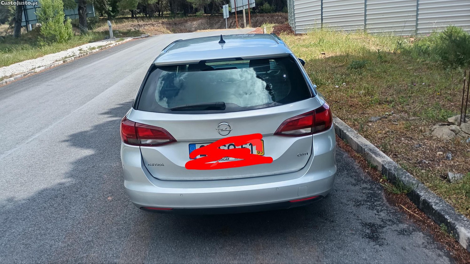 Opel Astra Sports Tourer - 17 — photo 3