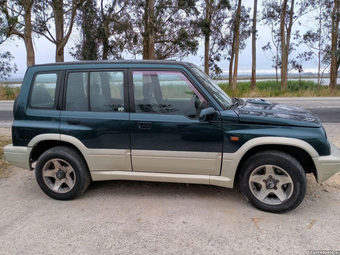 Suzuki Grand Vitara 2.0 td - 97 — photo 3