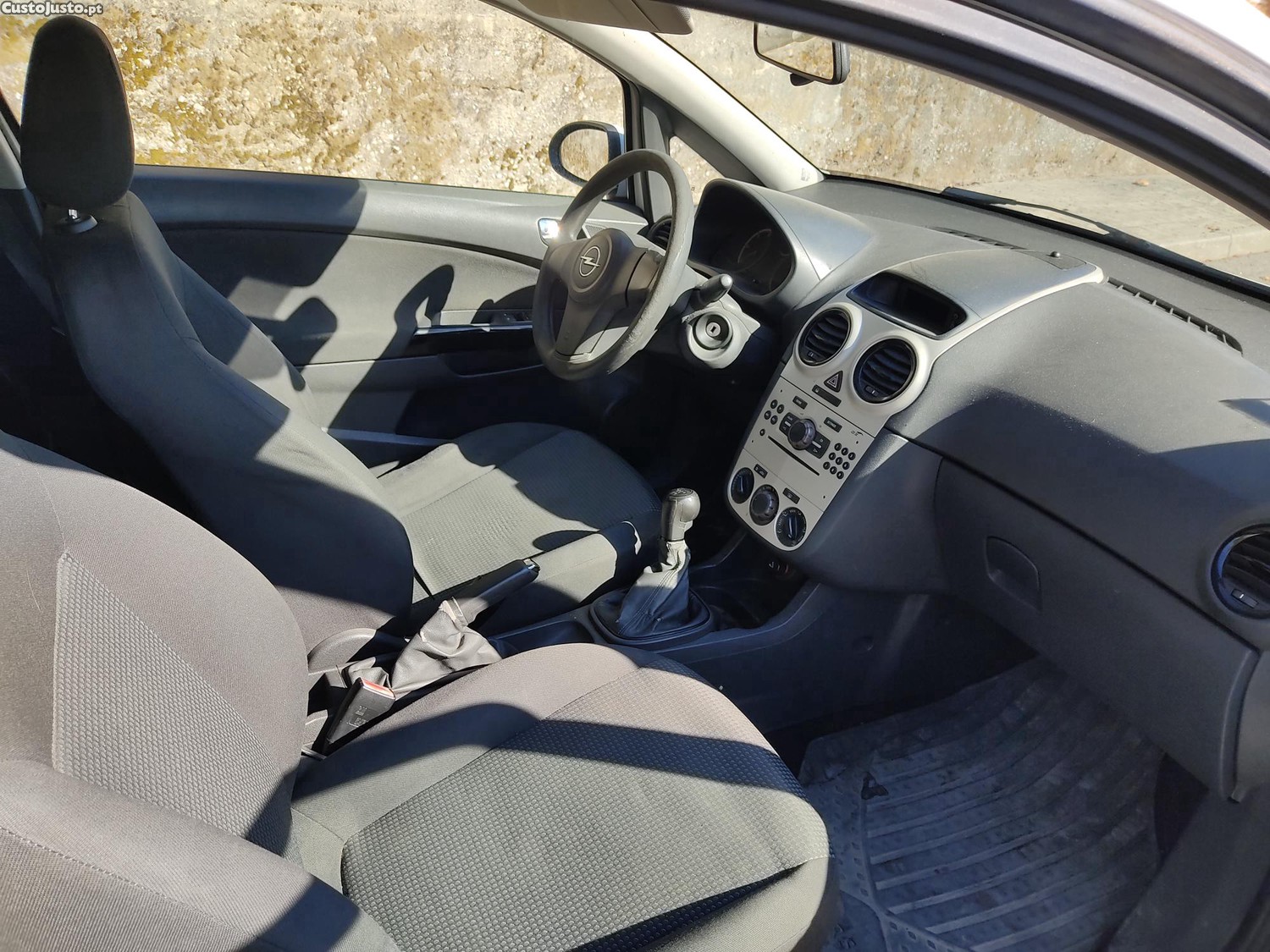Opel Corsa D 1.3cdti - 08 — photo 4