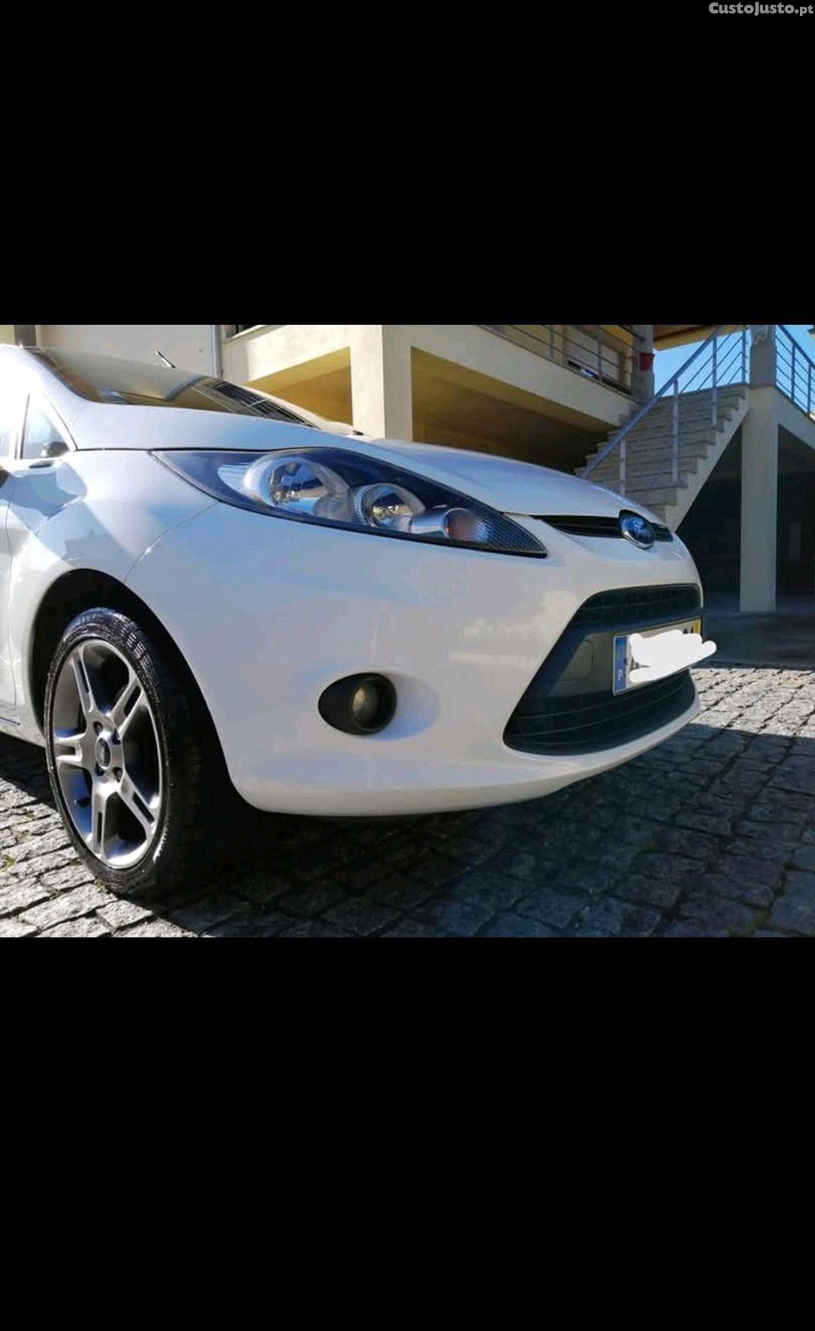 Ford Fiesta 1.4 TDCI - 11 — photo 2