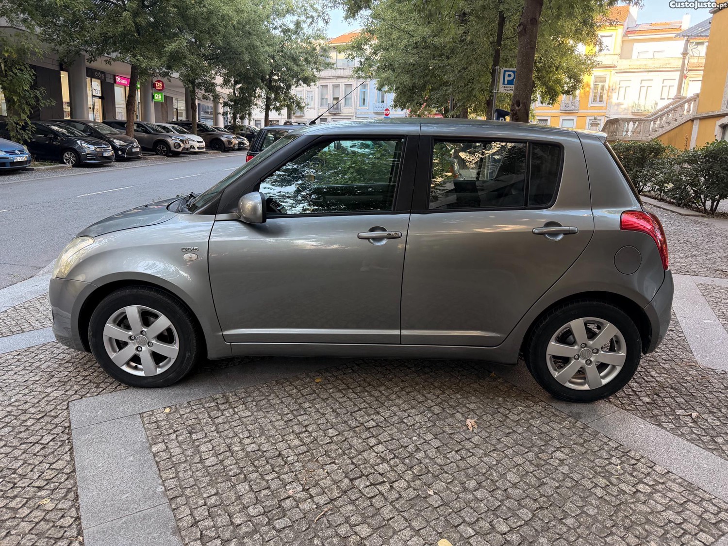 Suzuki Swift 1.3 DDIS Quiksilver - 08 — photo 2