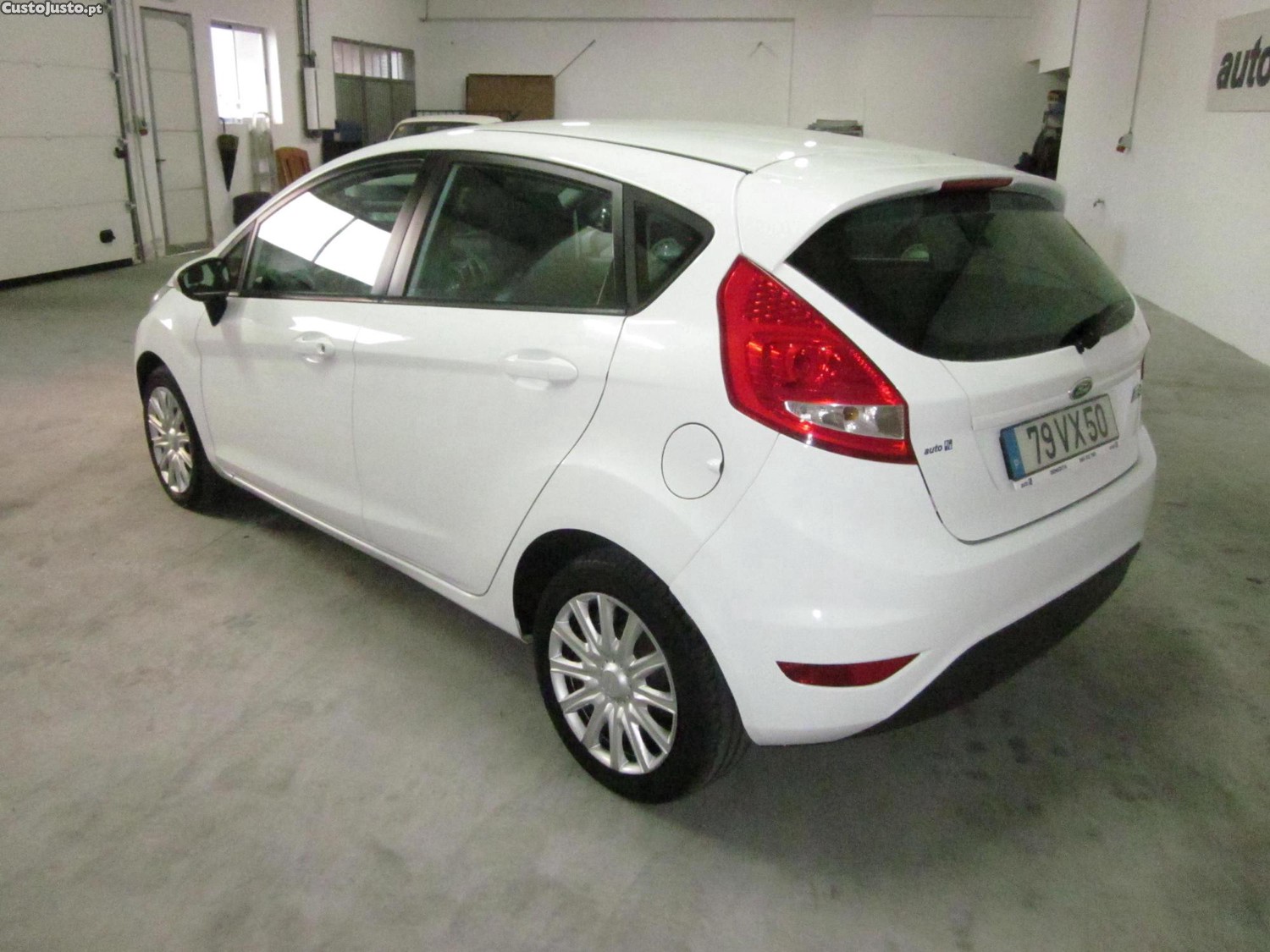 Ford Fiesta 1.4 TDCI - 19 — photo 4