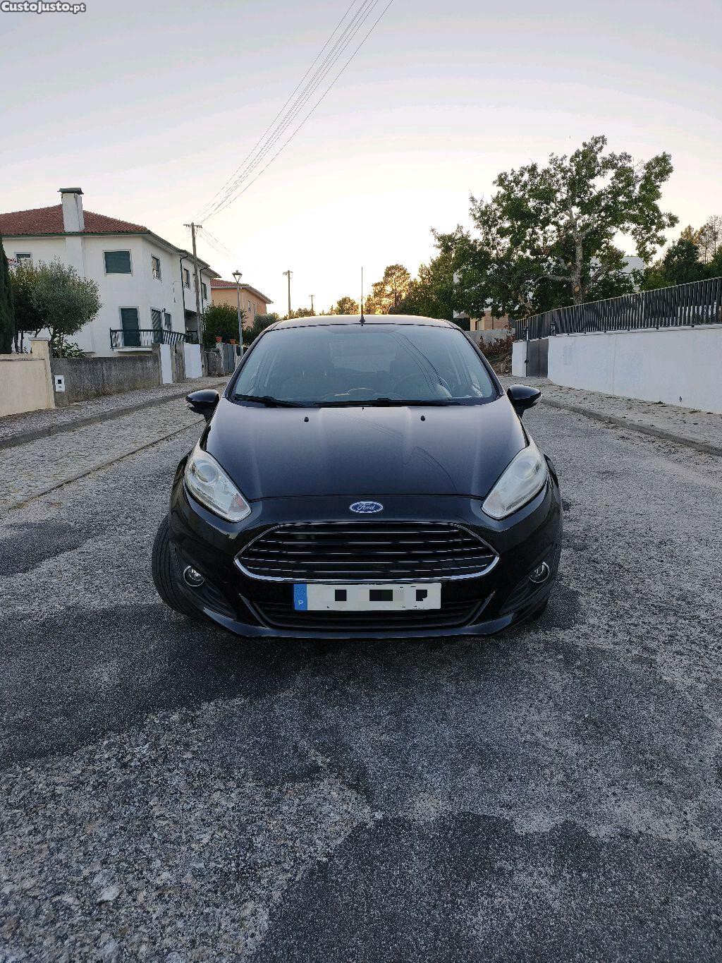 Ford Fiesta 1.5 TDCi versão Titanium 5 portas - 16 — photo 2