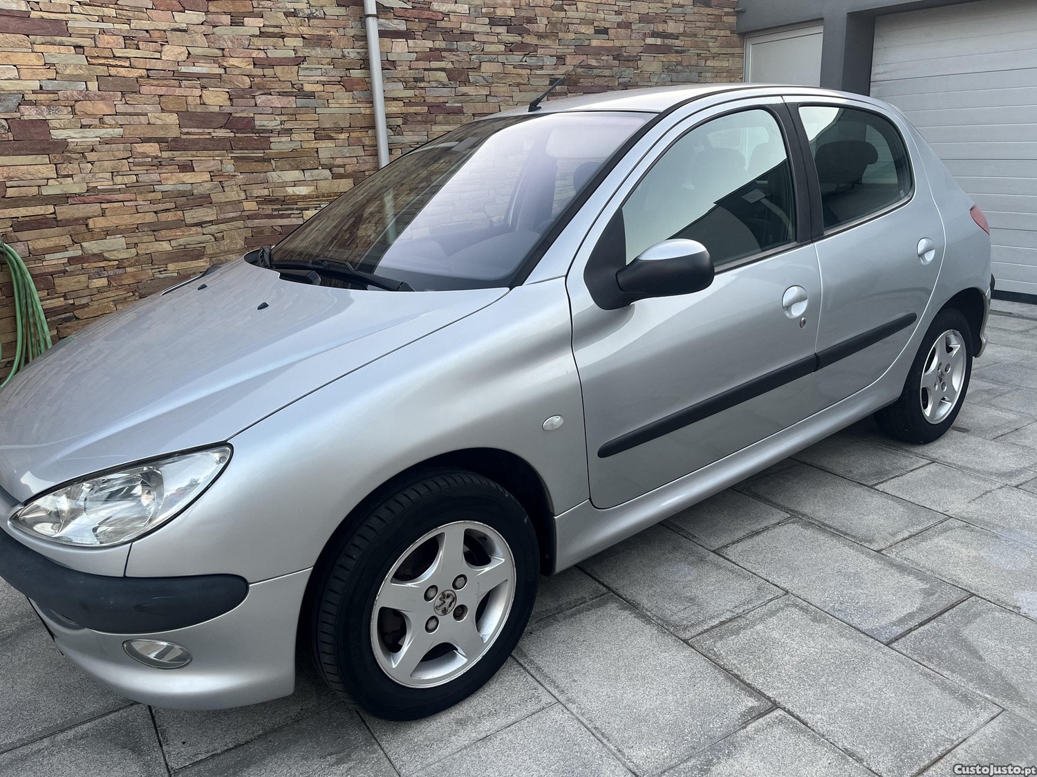 Peugeot 206 160 mil — fotografia 10