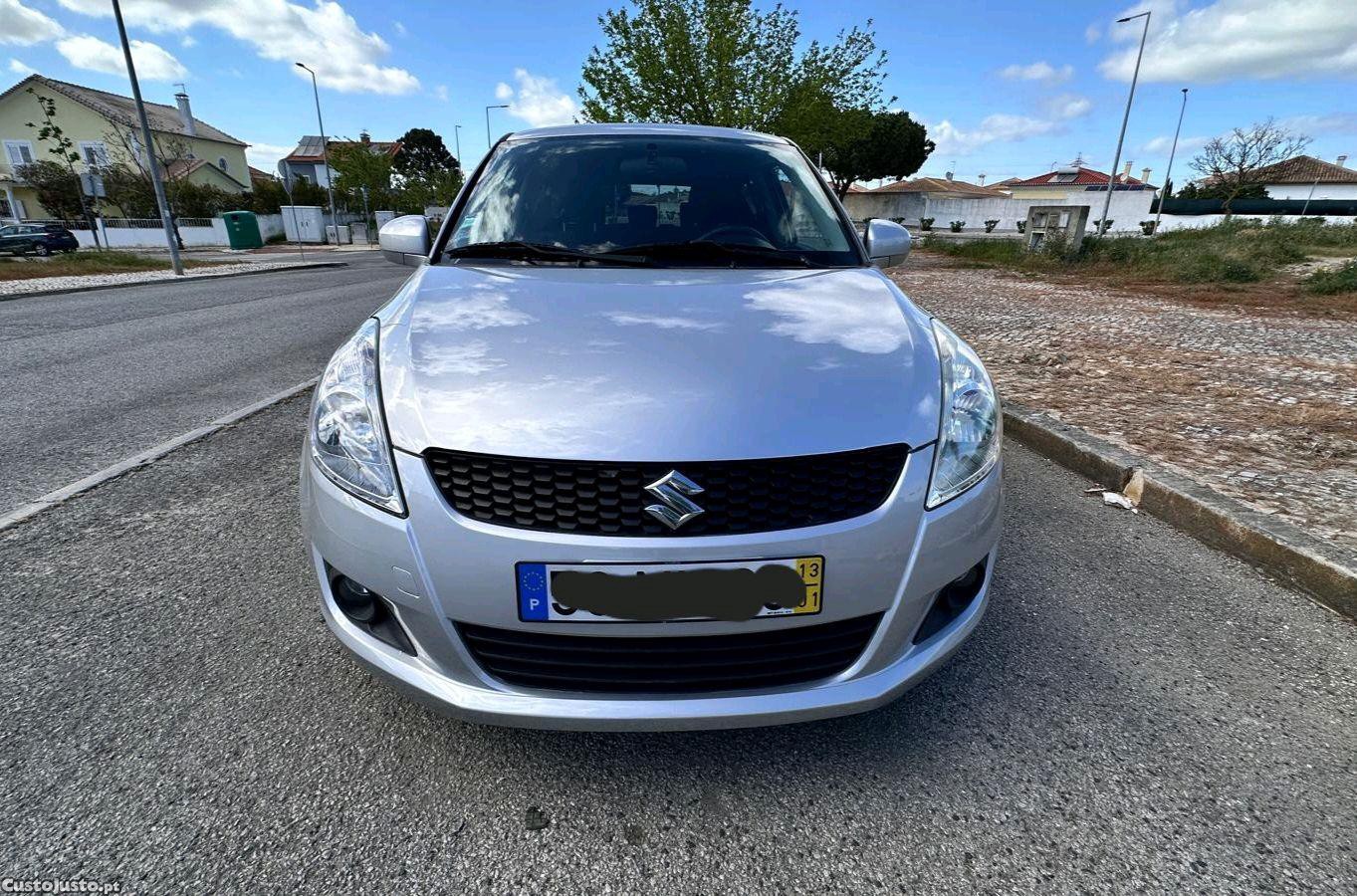 Suzuki Swift 1.2 Gasolina 2013 VVT - 13 foto 2