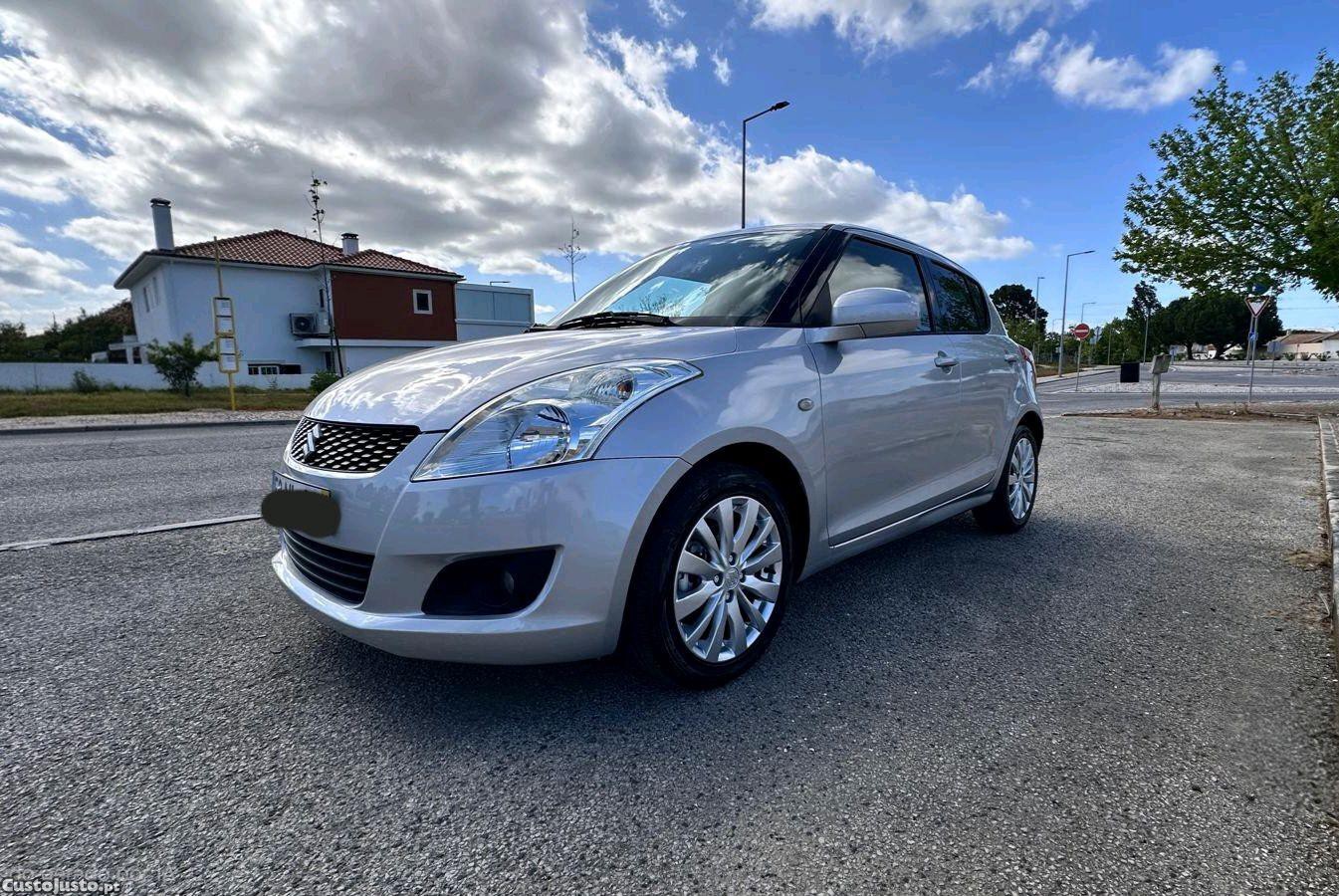 Suzuki Swift 1.2 Gasolina 2013 VVT - 13 foto 3