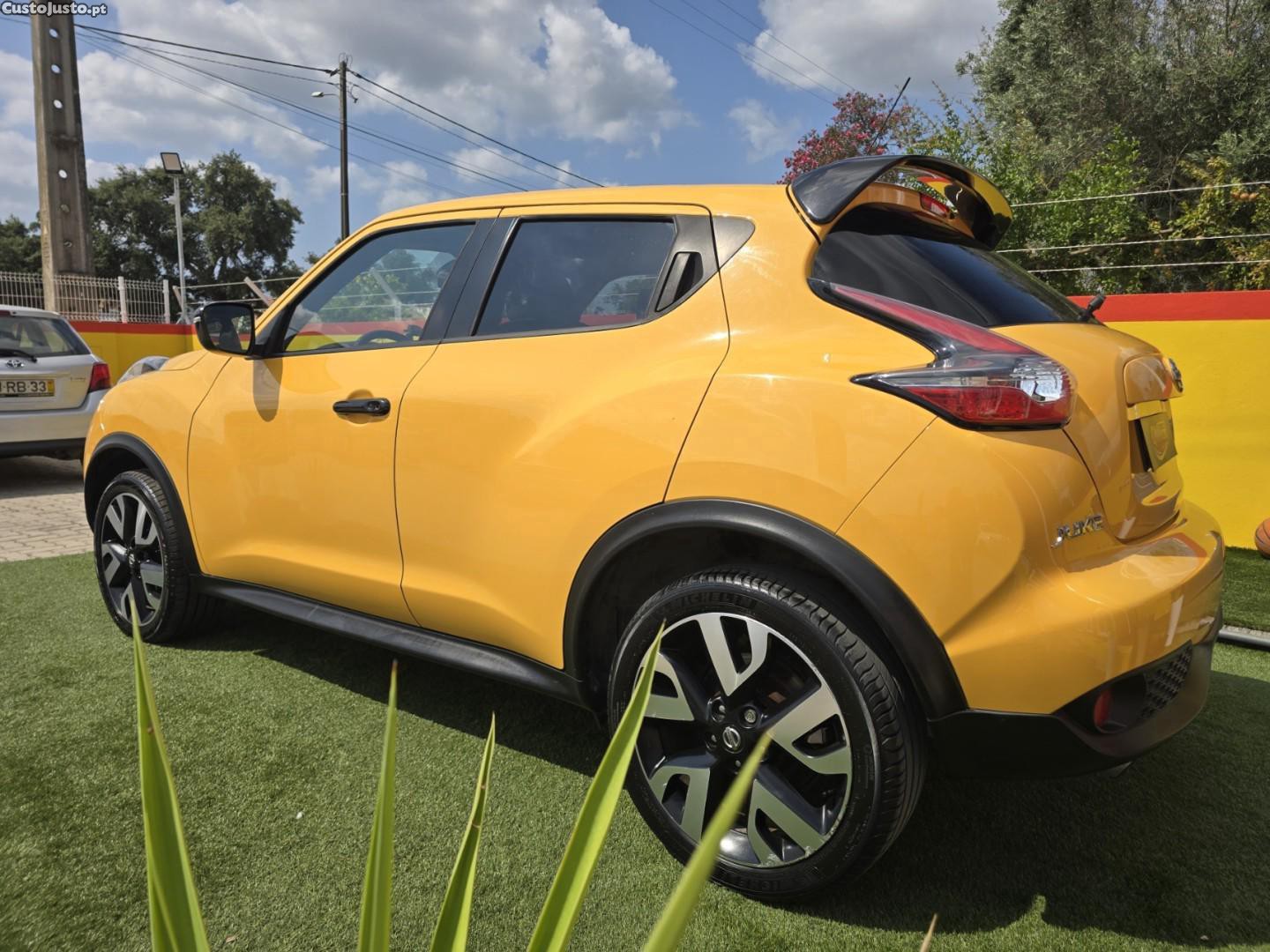 Nissan Juke 1.6 DIG-T Tekna Premium Ext.1 Yellow S. — fotografia 16