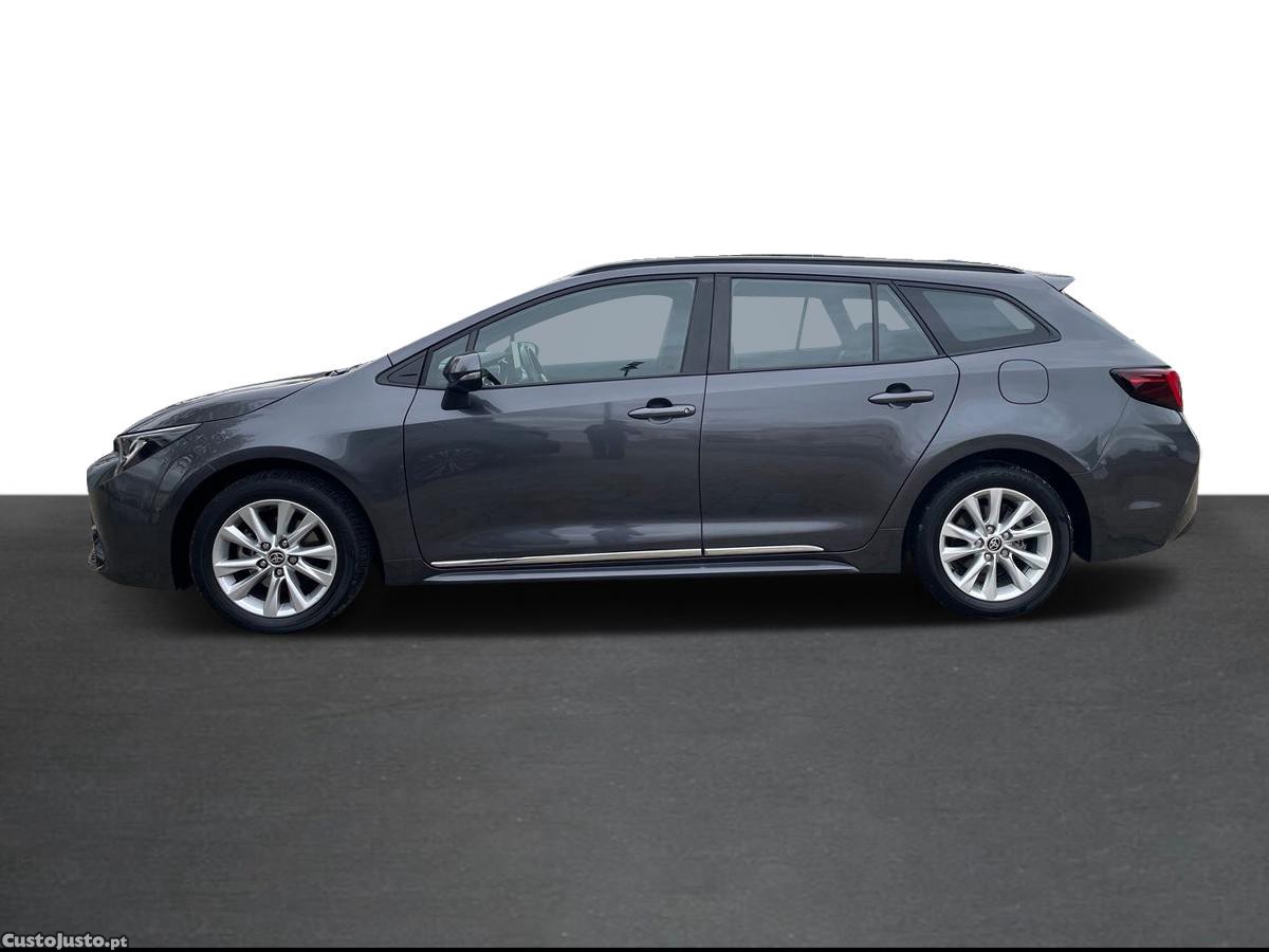 Toyota Corolla TS 1.8 Hybrid Comfort — fotografia 16
