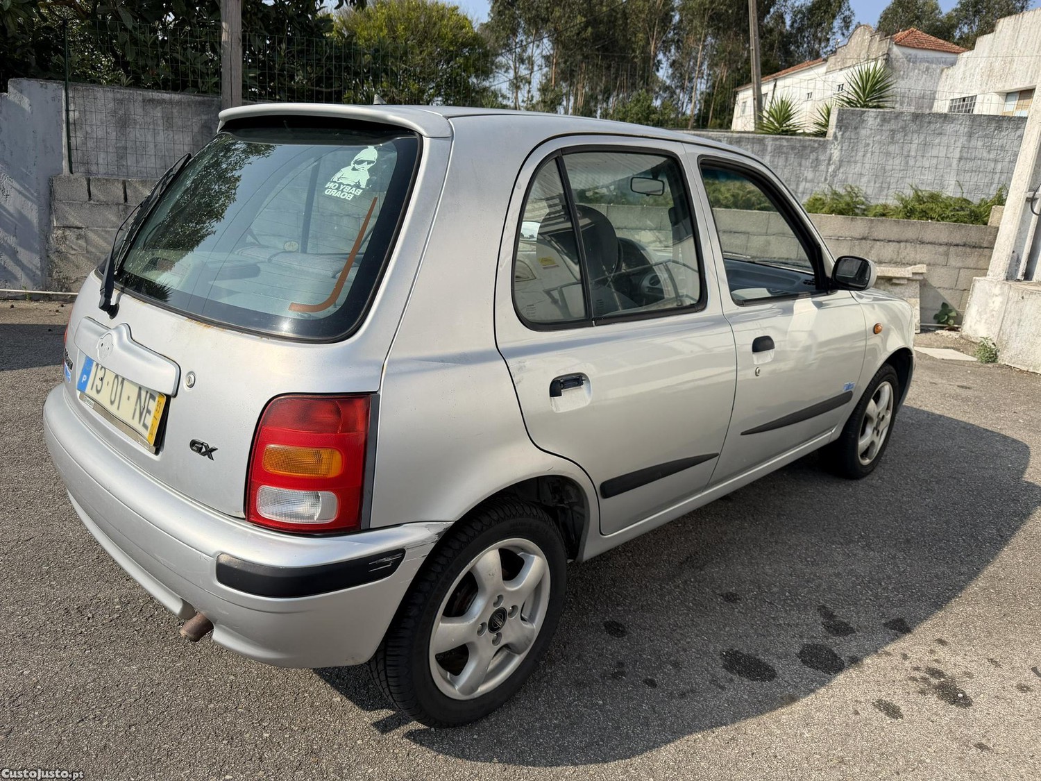Nissan Micra 1.0i — fotografia 12
