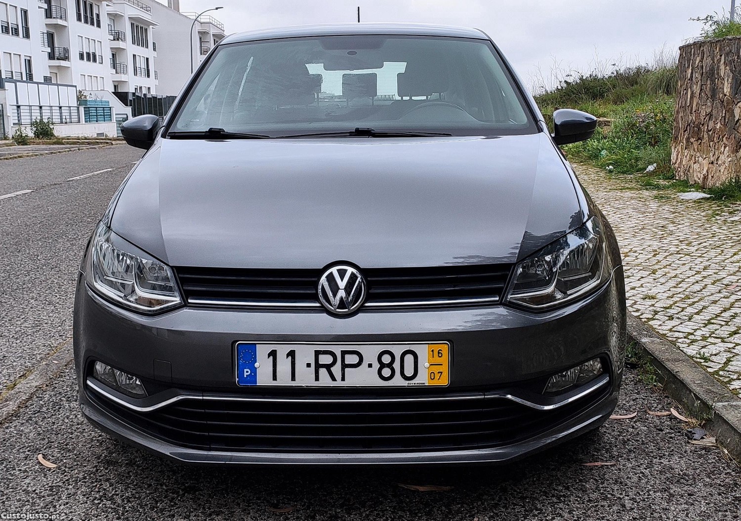 Volkswagen Polo 1.4 TDi Confortline Nacional — fotografia 7