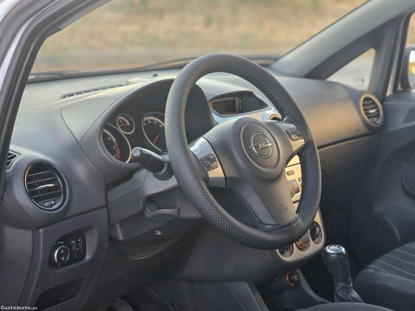 Opel Corsa D 1.2 (2010) — fotografia 7