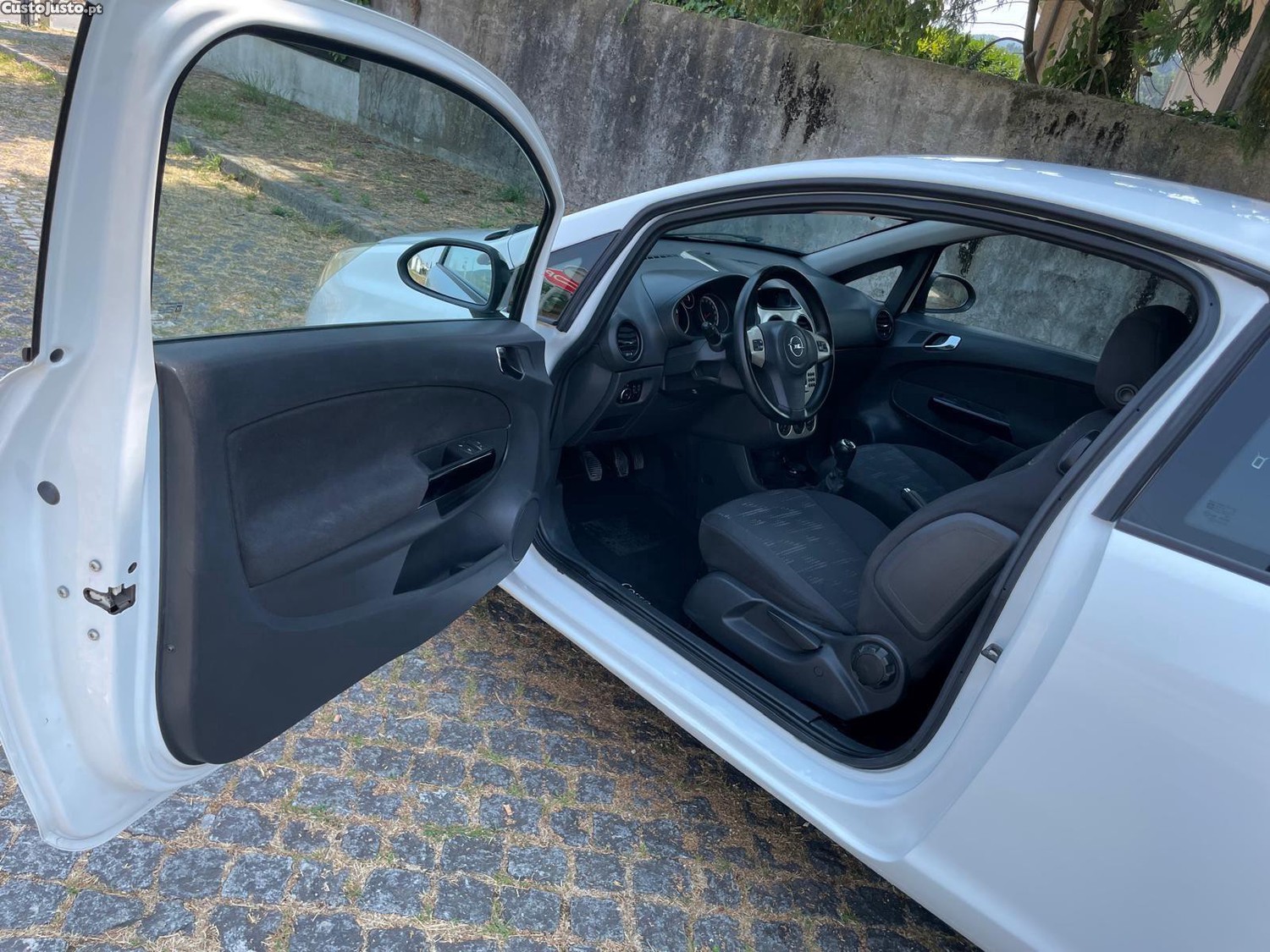 Opel Corsa D - 11 foto 5