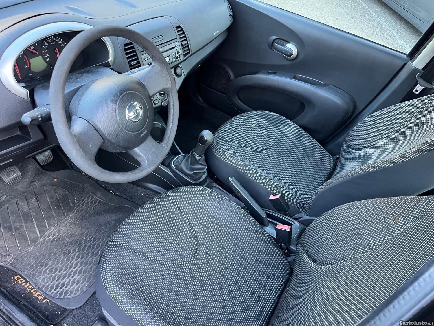 Nissan Micra Confort — fotografia 12