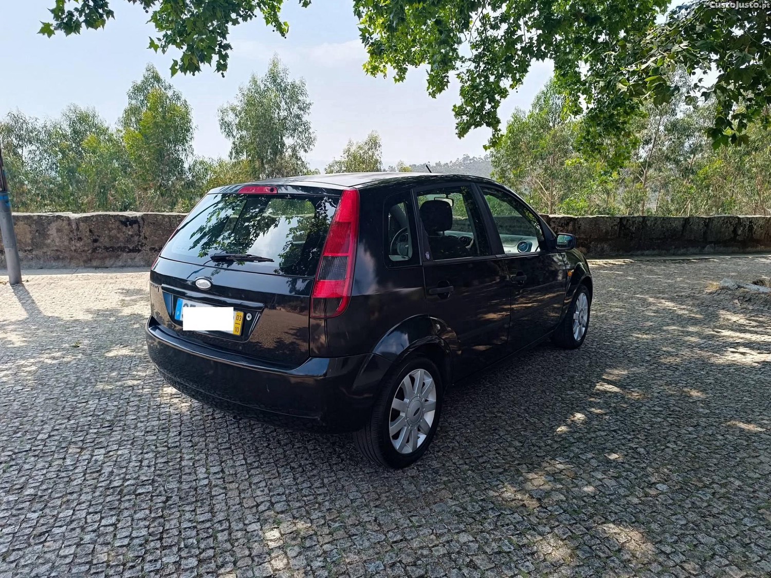 Ford Fiesta 1.25c/ revisão — fotografia 13