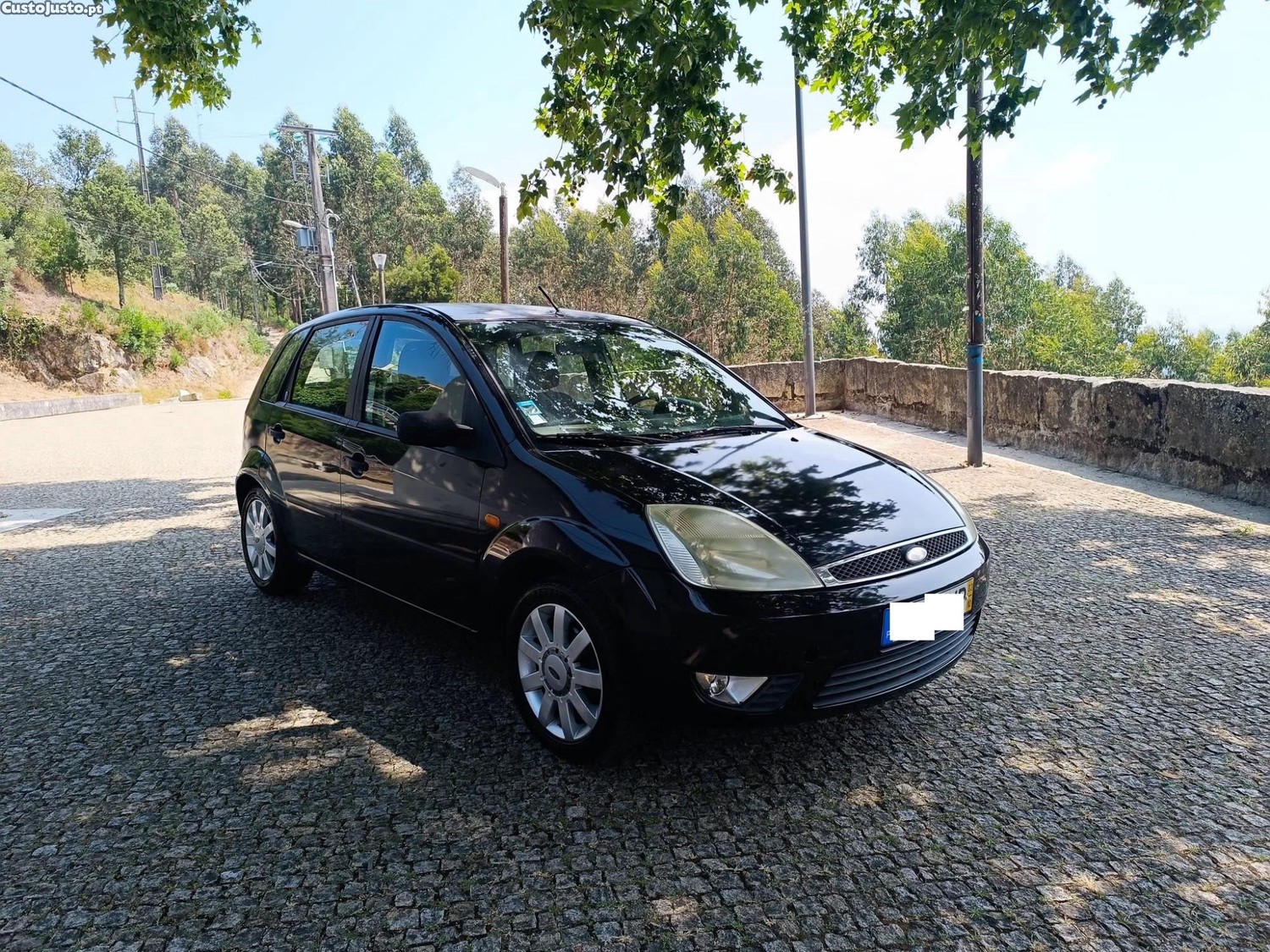 Ford Fiesta 1.25c/ revisão — fotografia 16